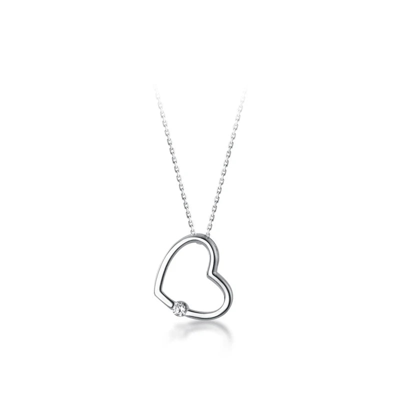 Cœur creux en zircon blanc et rose 