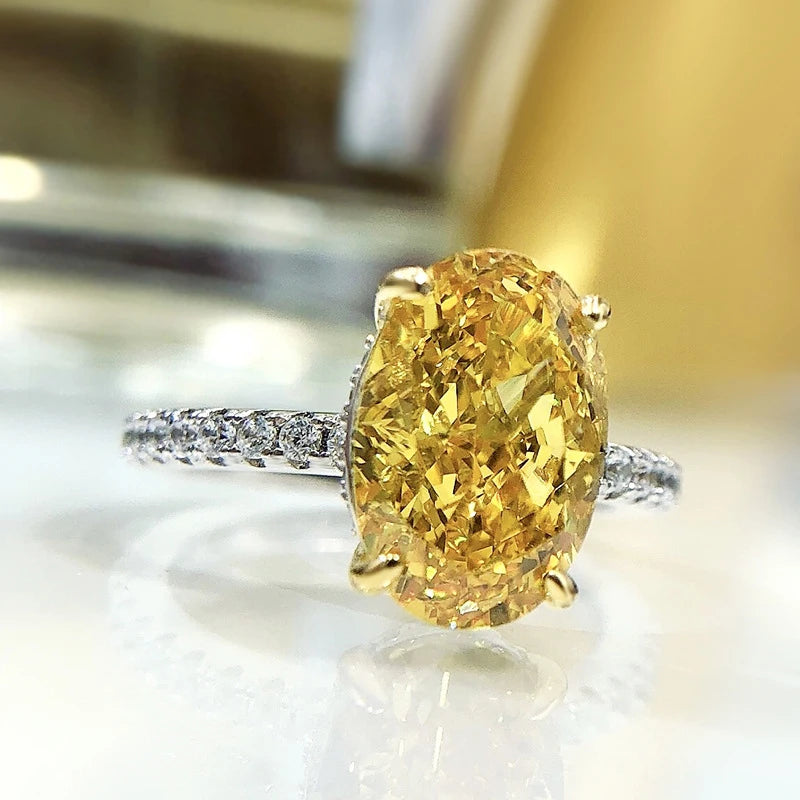Oval Yellow High Carbon Diamond Rings