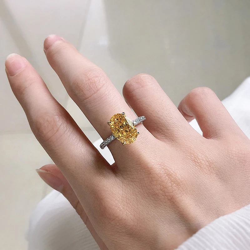 Oval Yellow High Carbon Diamond Rings