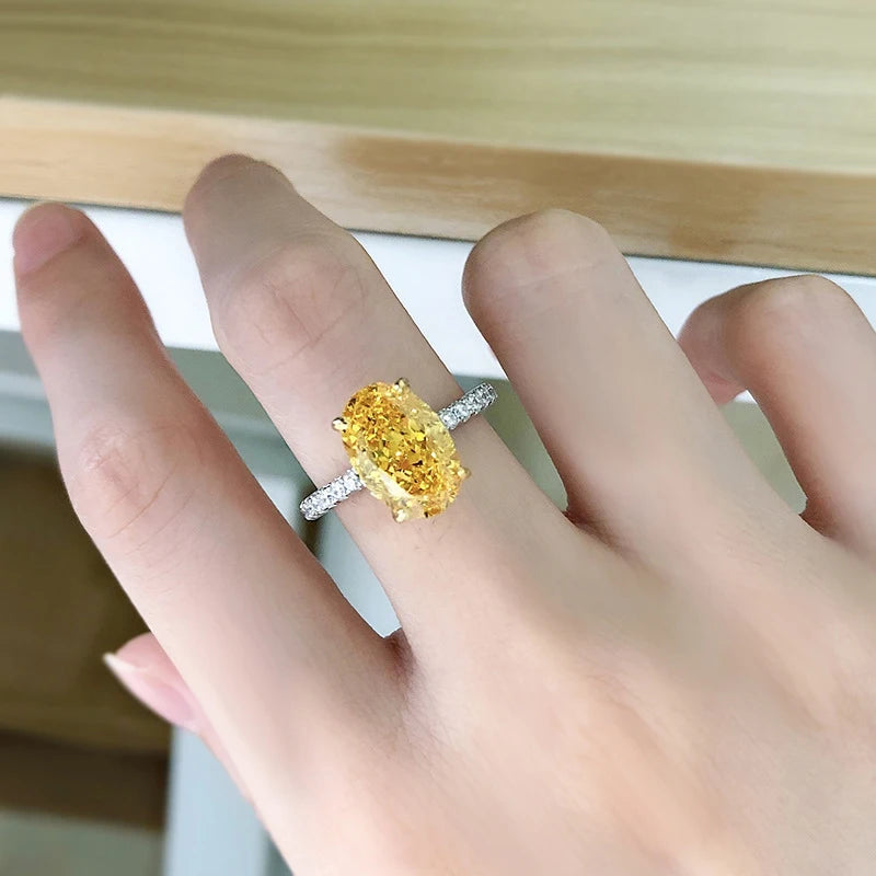 Oval Yellow High Carbon Diamond Rings