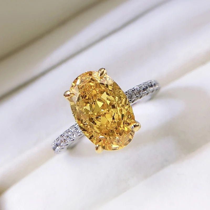 Oval Yellow High Carbon Diamond Rings