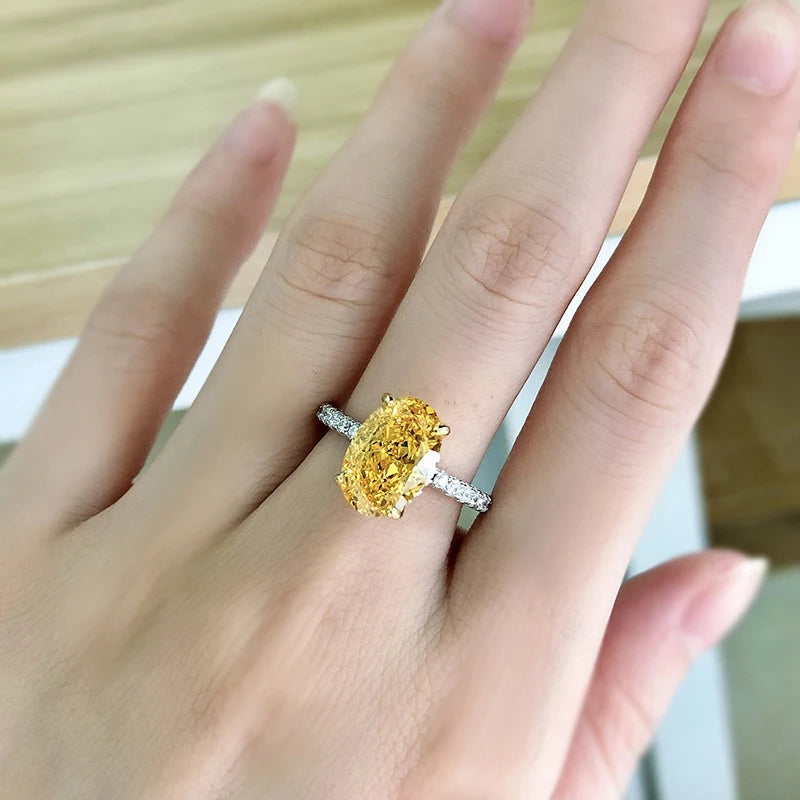 Oval Yellow High Carbon Diamond Rings