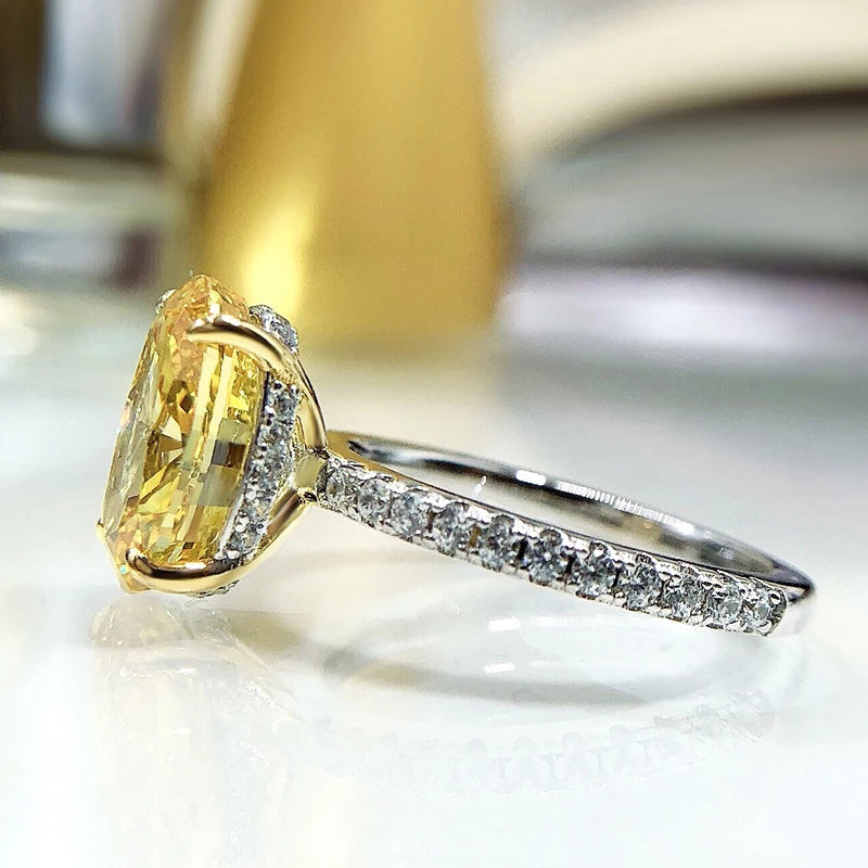 Oval Yellow High Carbon Diamond Rings