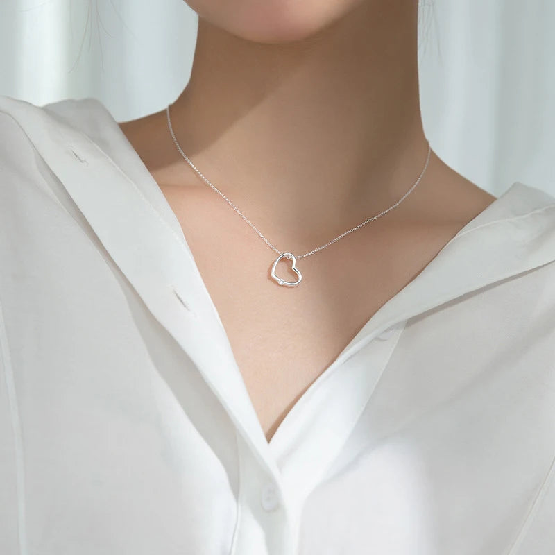 Cœur creux en zircon blanc et rose 