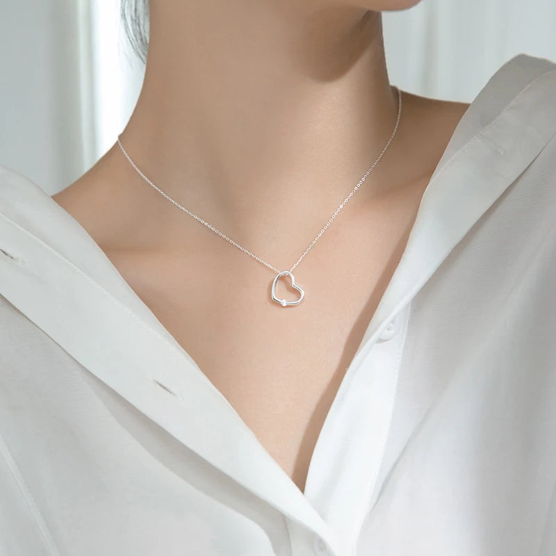 Cœur creux en zircon blanc et rose 